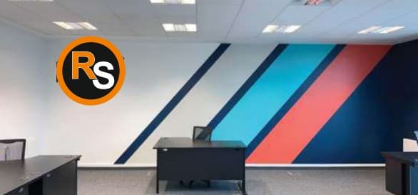 Office interior with RS Enterprises wall branding